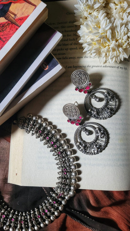 Side view of Moh Earrings in pure silver with handcrafted detailing