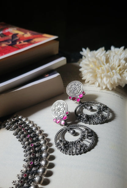 Side view of Moh Earrings in pure silver with handcrafted detailing