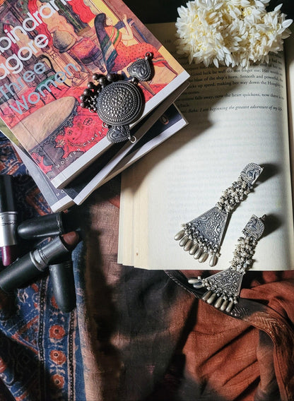 Side view of Sahaj Earrings in pure silver with handcrafted detailing