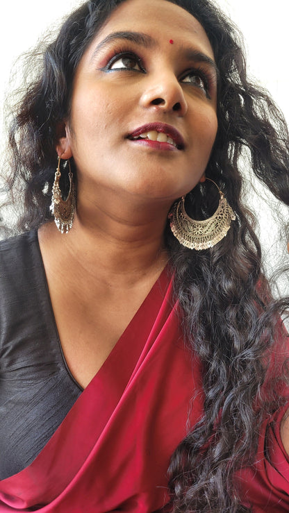 Side view of Aabharana Vintage Chandbaali in pure silver with vintage detailing