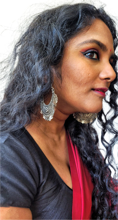 Side view of Aabharana Vintage Chandbaali in pure silver with vintage detailing