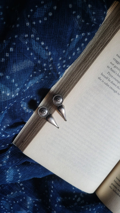 Side view of Irya Earrings in pure silver with handcrafted detailing