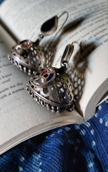 Side view of Falak Jhumka in pure silver with handcrafted detailing