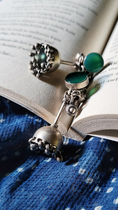 Side view of Teejh Jhumka in pure silver with handcrafted detailing