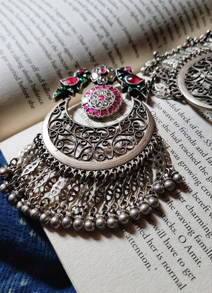 Side view of Mihika Chandbaali in pure silver with handcrafted detailing
