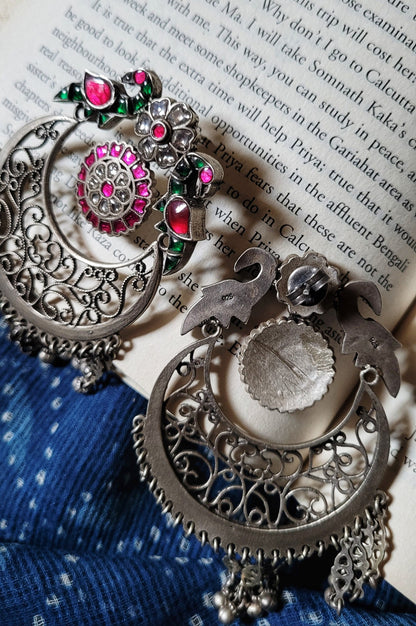 Side view of Mihika Chandbaali in pure silver with handcrafted detailing