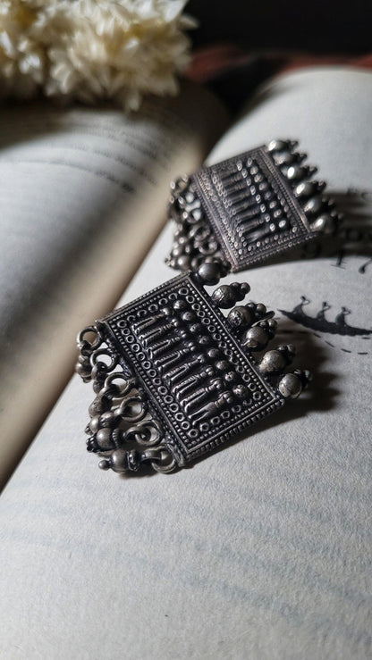 Side view of Aakar Earrings in pure silver with handcrafted detailing