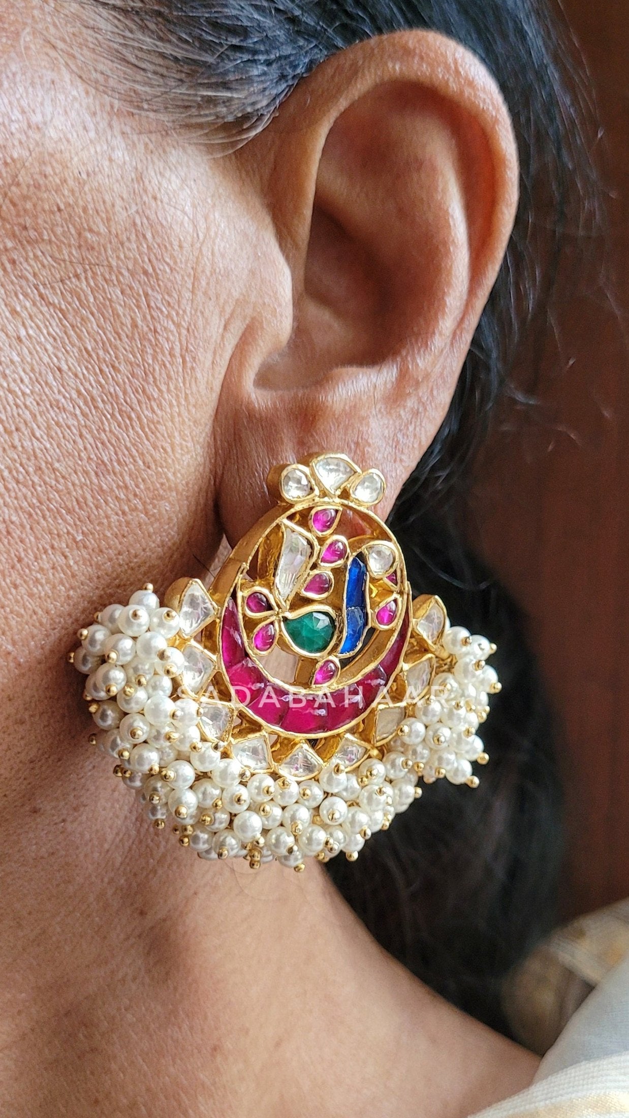 Side view of Aarna Chandbaali in pure silver with handcrafted detailing