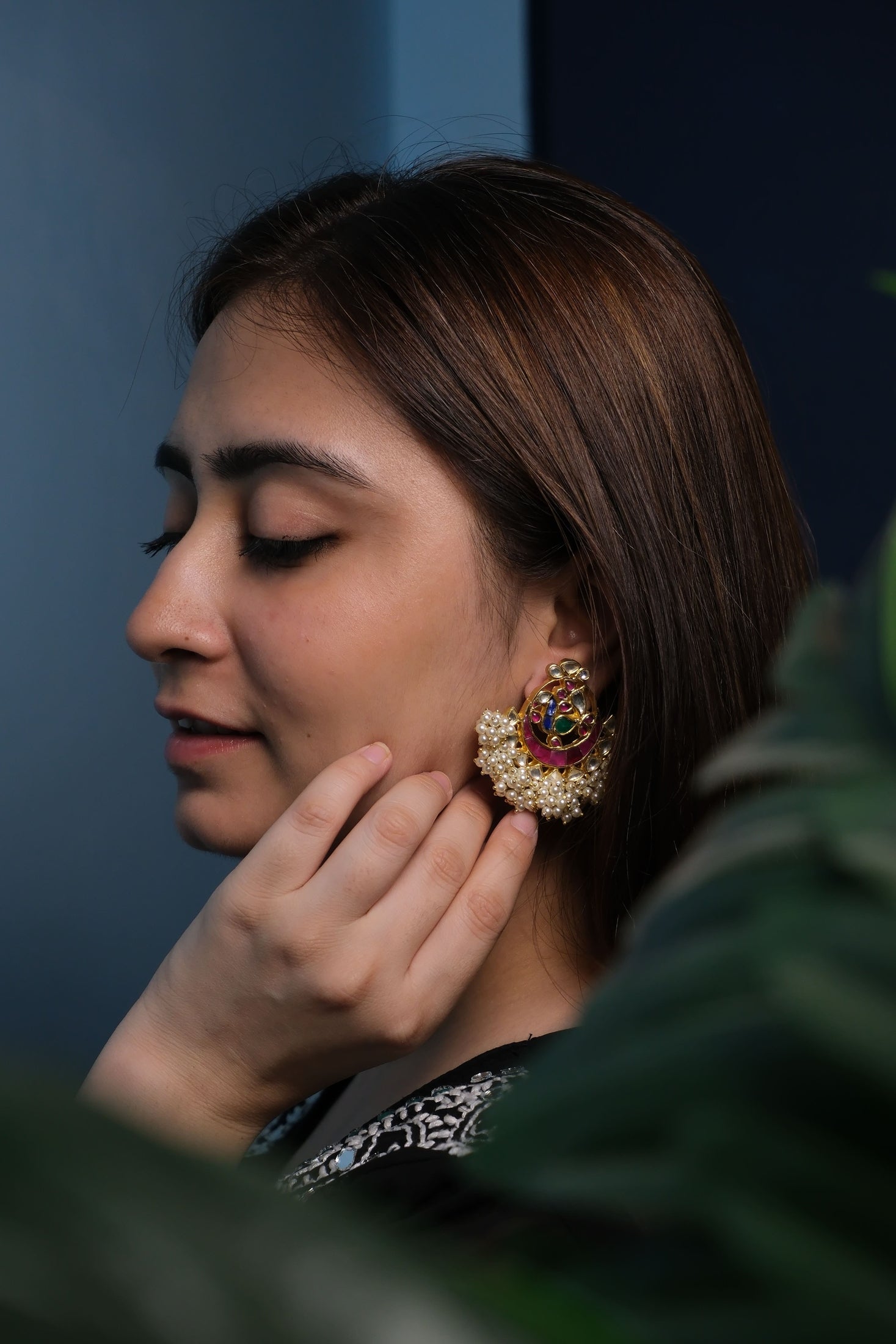 Side view of Aarna Chandbaali in pure silver with handcrafted detailing