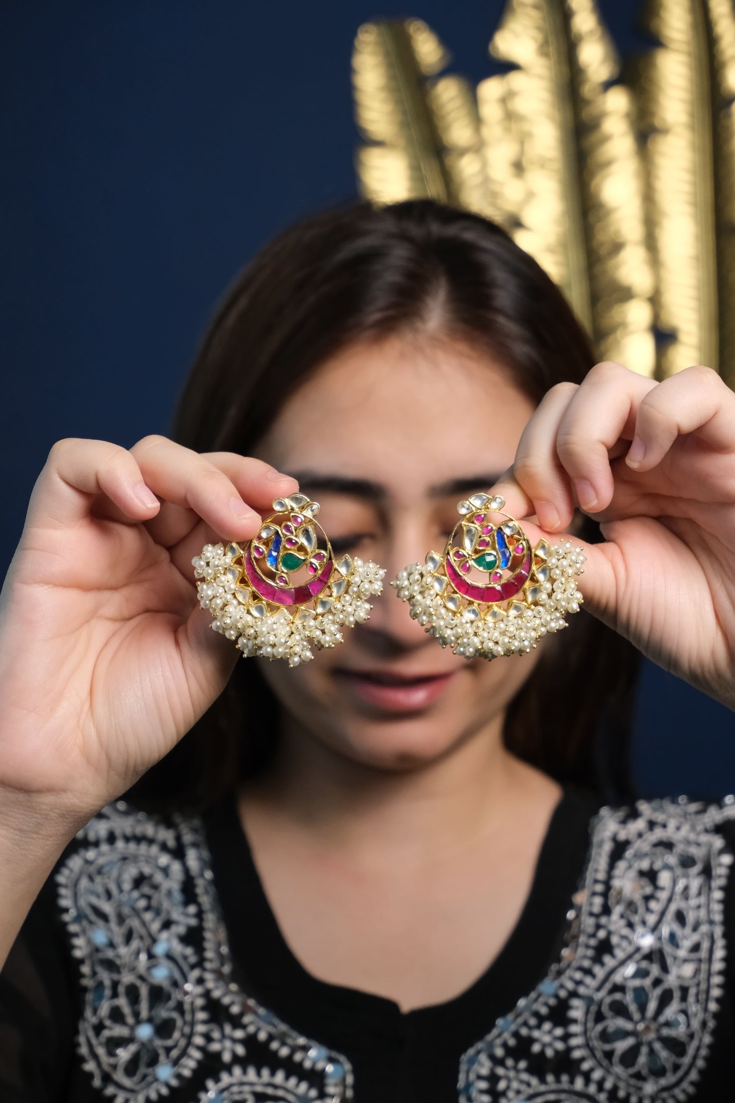 Side view of Aarna Chandbaali in pure silver with handcrafted detailing