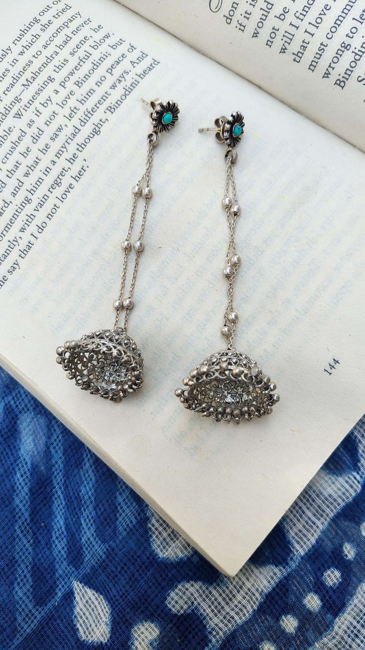 Sadabahaar Jewelry 92.5 Hallmark Silver Shoulder Duster Jhumkas with Filigree Work and Turquoise Stone Floral Studs for Women - top view