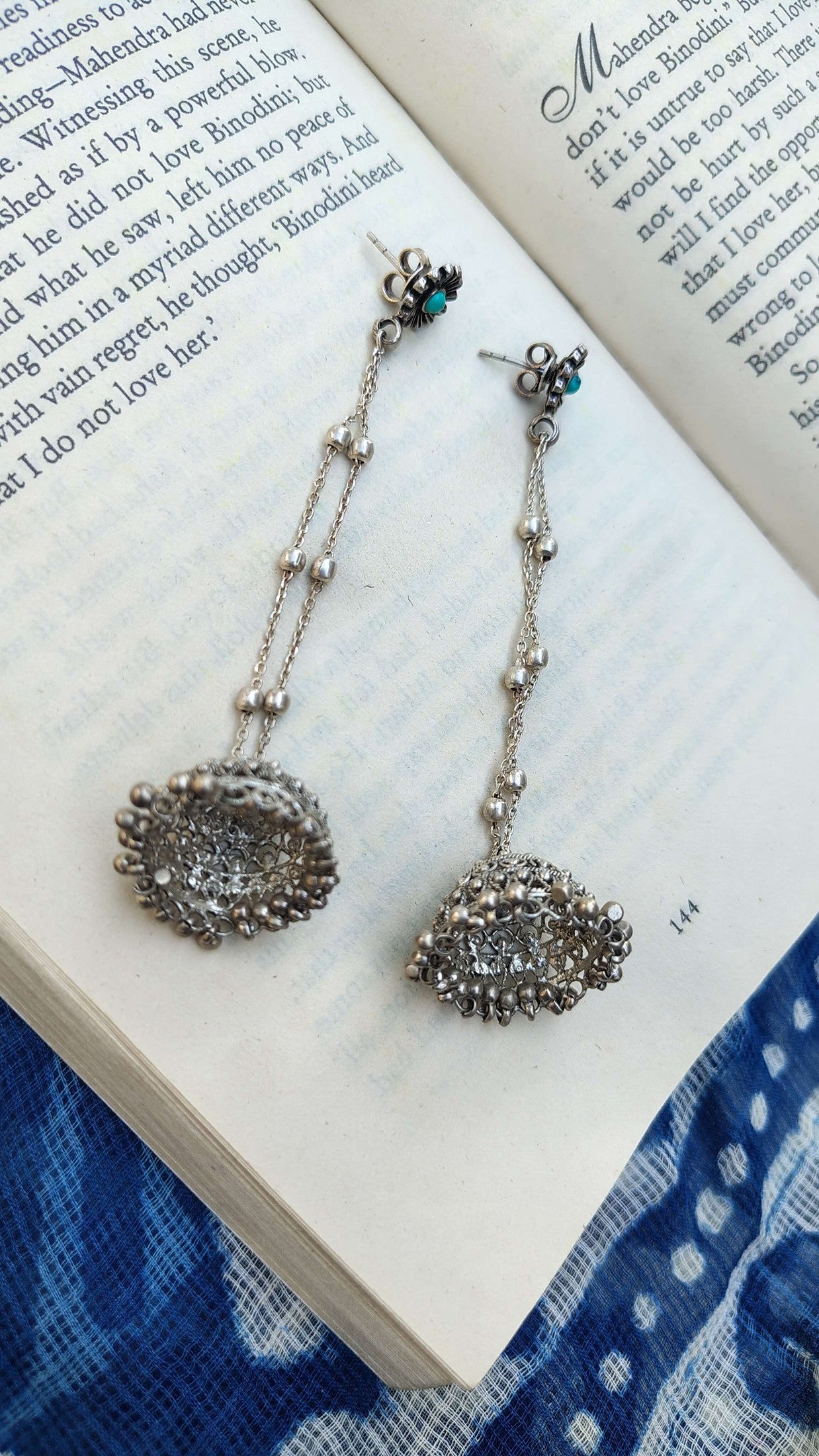 Sadabahaar Jewelry 92.5 Hallmark Silver Shoulder Duster Jhumkas with Filigree Work and Turquoise Stone Floral Studs for Women - top view