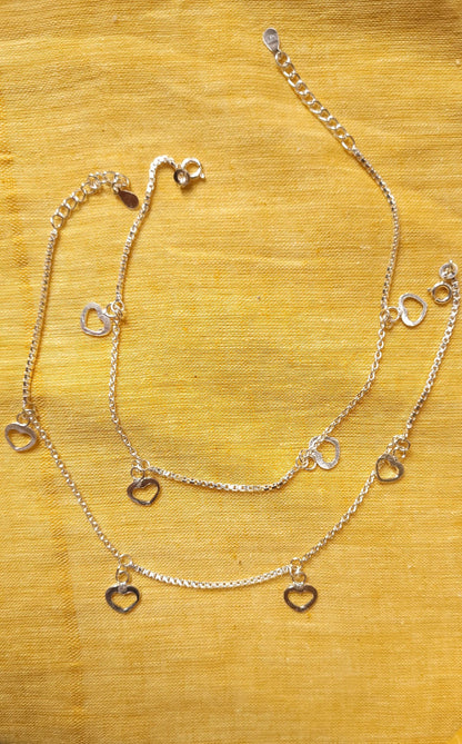 Side view of Aawara Dil Anklets in pure silver with handcrafted detailing