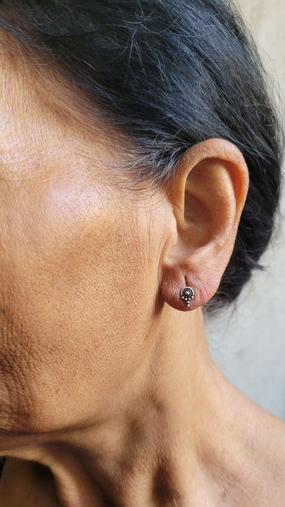 Side view of Ananta Studs in pure silver with handcrafted detailing