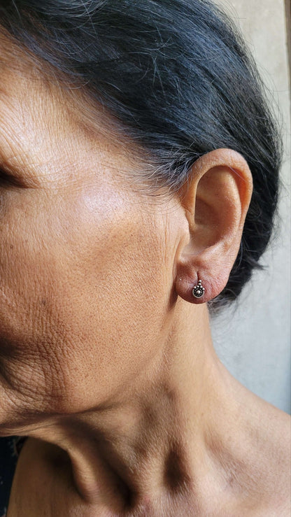 Side view of Ananta Studs in pure silver with handcrafted detailing