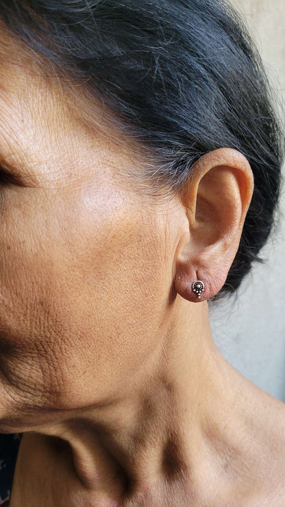Side view of Ananta Studs in pure silver with handcrafted detailing