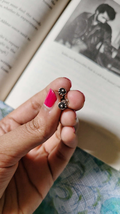 Side view of Ananta Studs in pure silver with handcrafted detailing