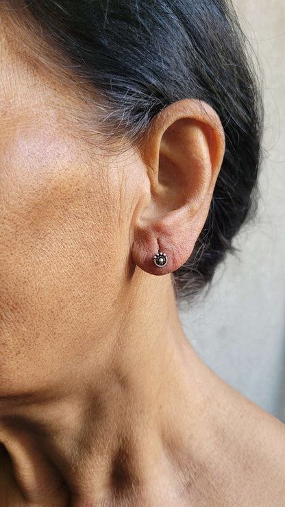 Side view of Ananta Studs in pure silver with handcrafted detailing