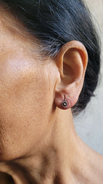 Side view of Ananta Studs in pure silver with handcrafted detailing
