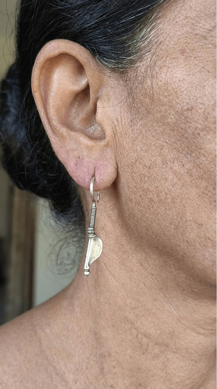 Side view of Angana Vintage Earrings in pure silver with vintage detailing