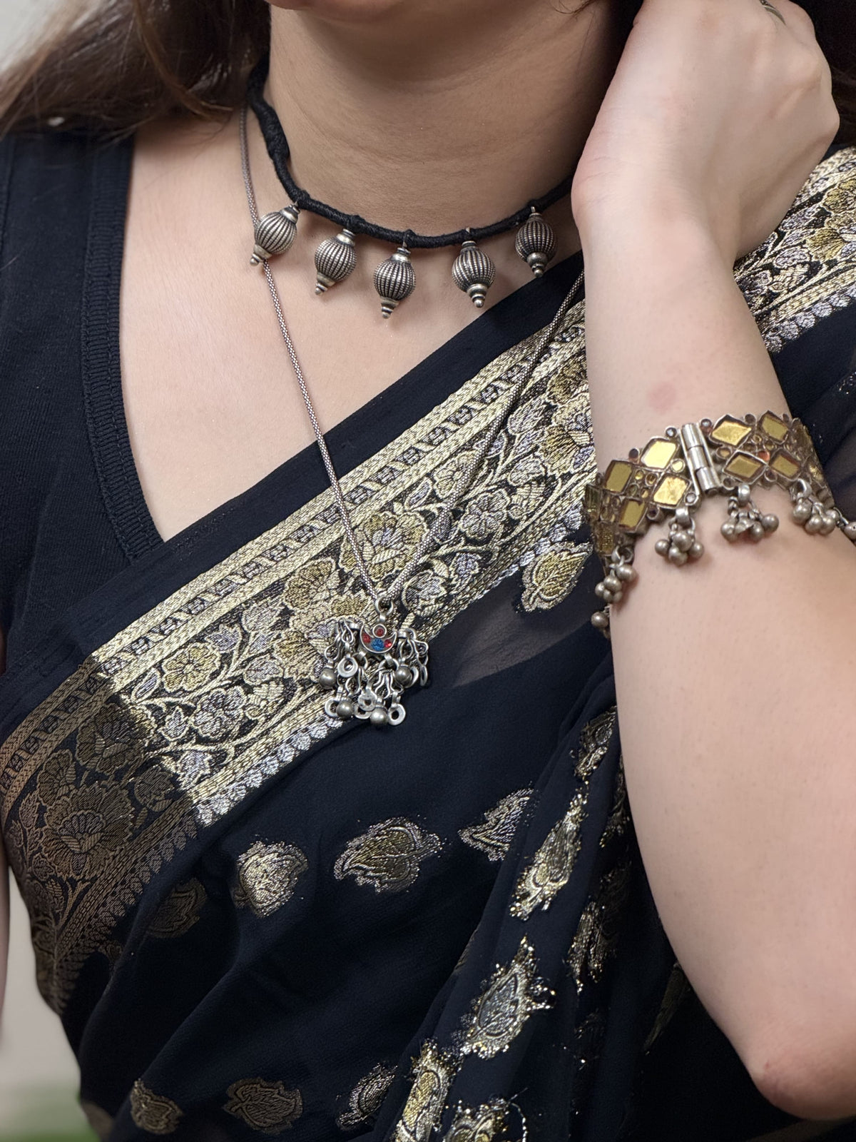 Styling silver jewelry with saree