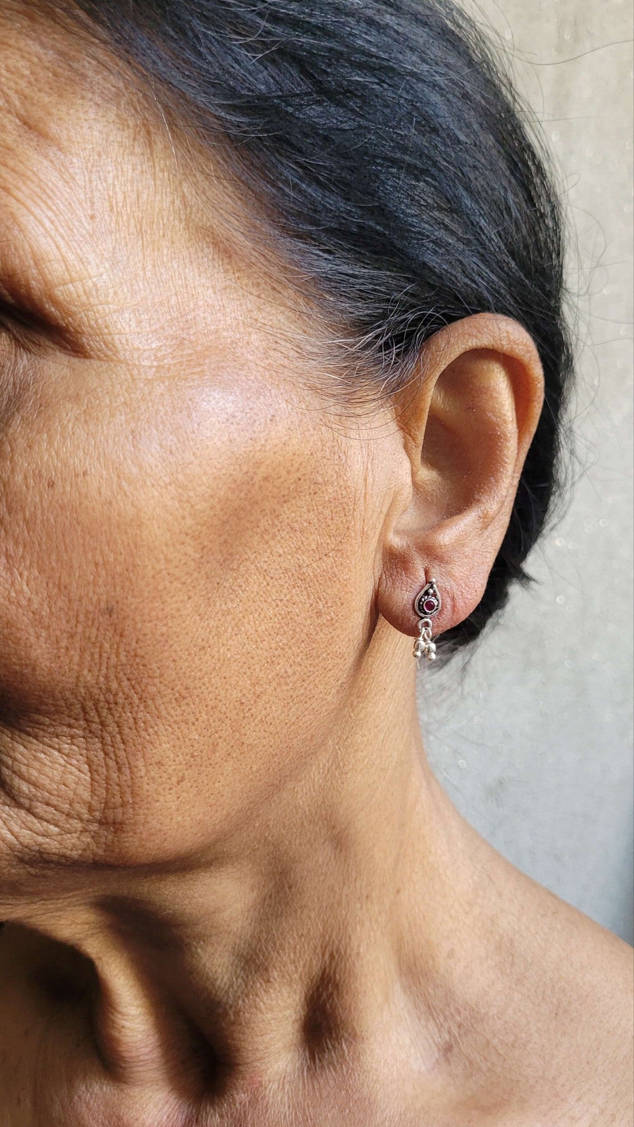 Side view of Athenia Studs in pure silver with handcrafted detailing