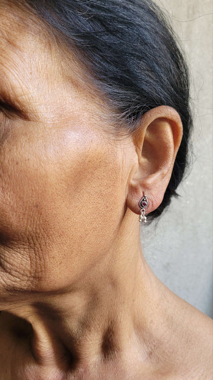 Side view of Athenia Studs in pure silver with handcrafted detailing