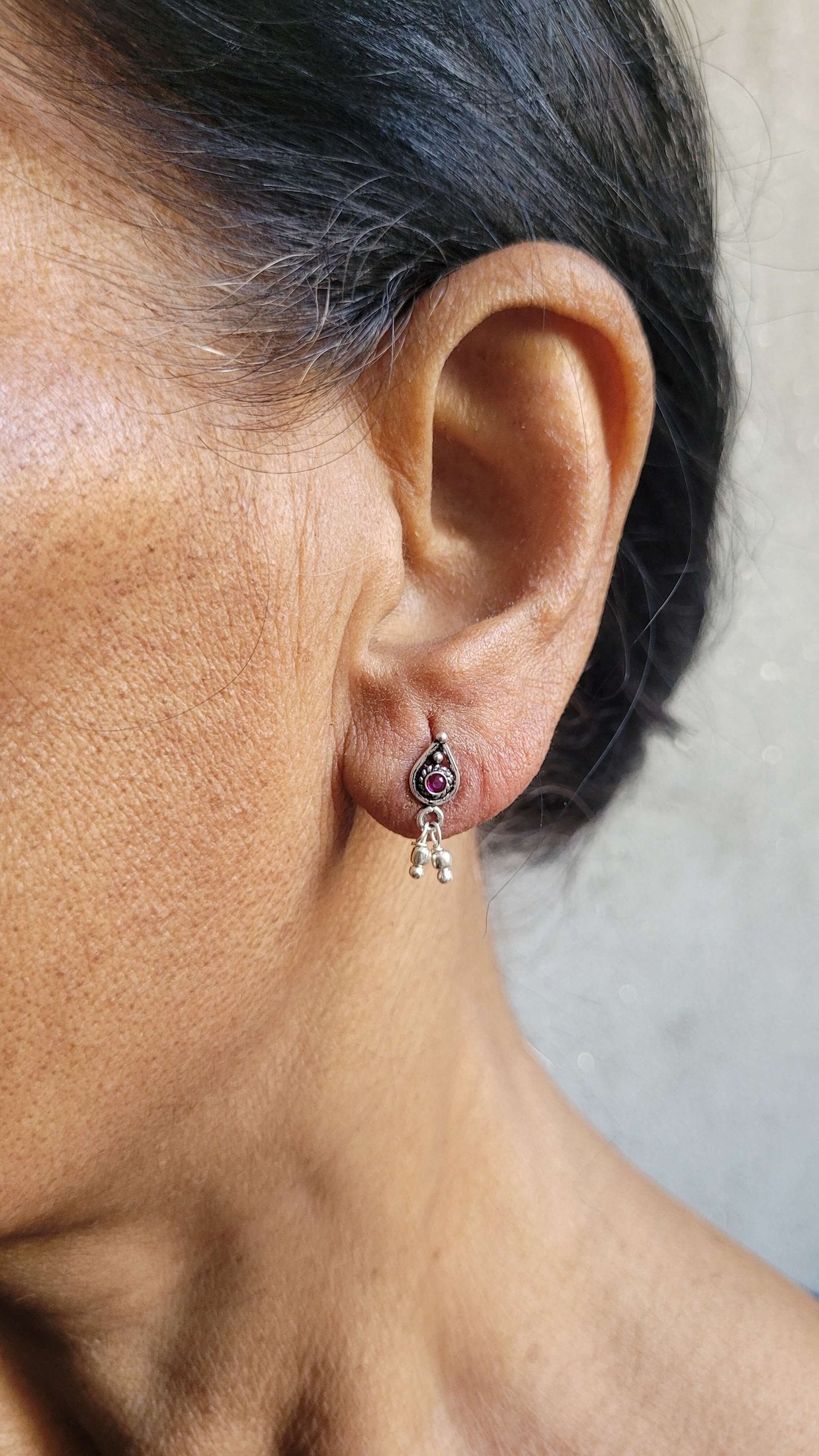 Side view of Athenia Studs in pure silver with handcrafted detailing