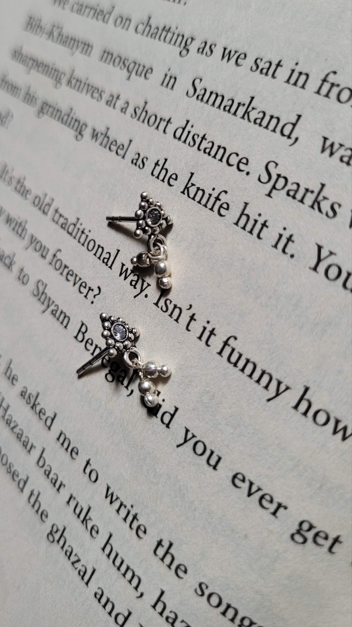 Side view of Athenia Studs in pure silver with handcrafted detailing