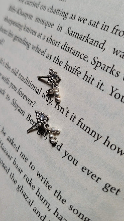 Side view of Athenia Studs in pure silver with handcrafted detailing