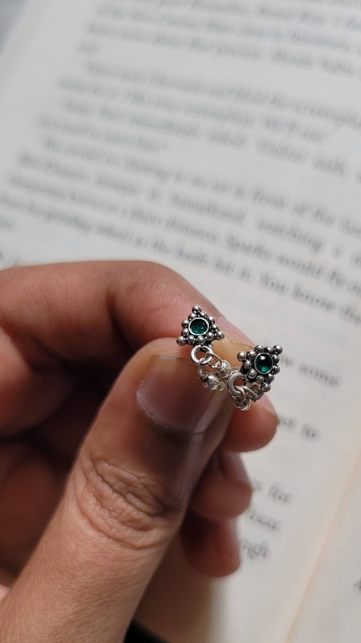 Side view of Athenia Studs in pure silver with handcrafted detailing