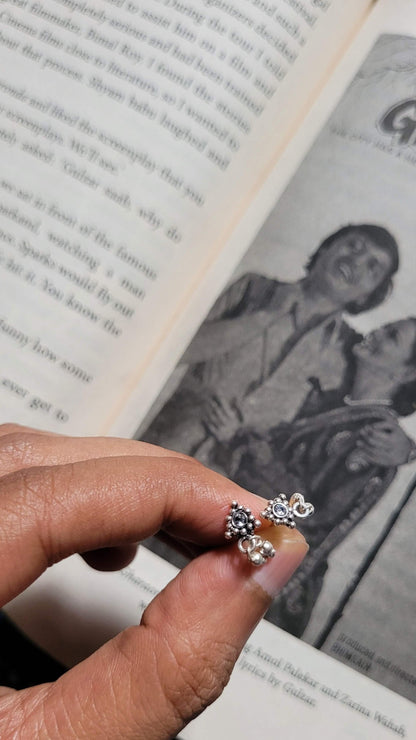 Side view of Athenia Studs in pure silver with handcrafted detailing