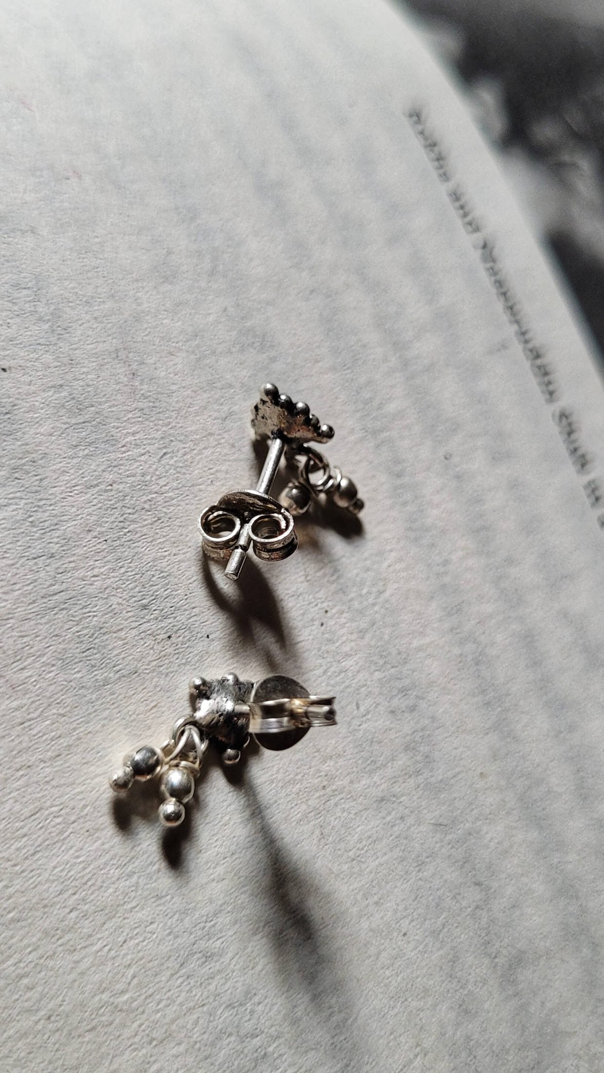 Side view of Athenia Studs in pure silver with handcrafted detailing