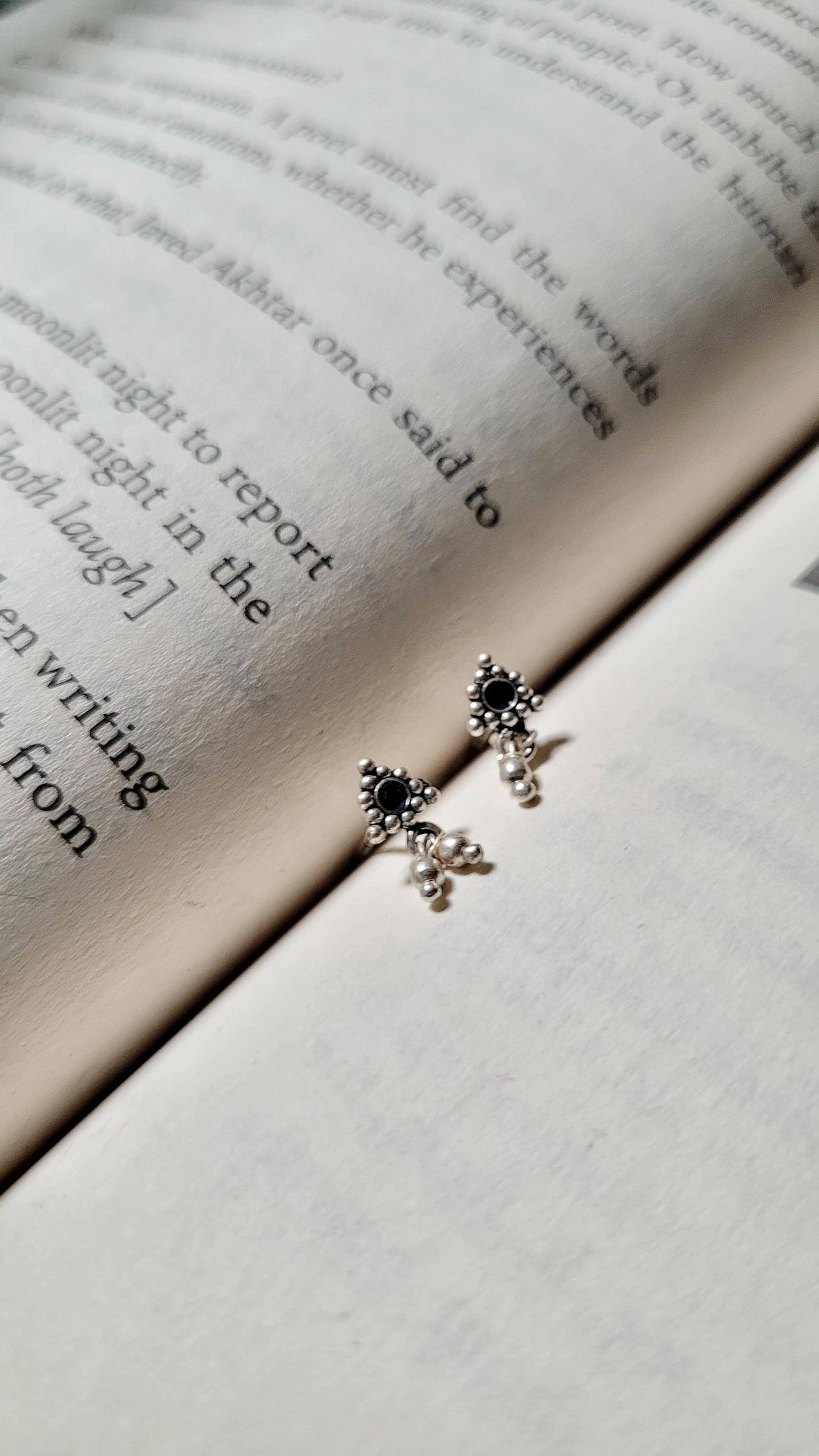 Side view of Athenia Studs in pure silver with handcrafted detailing