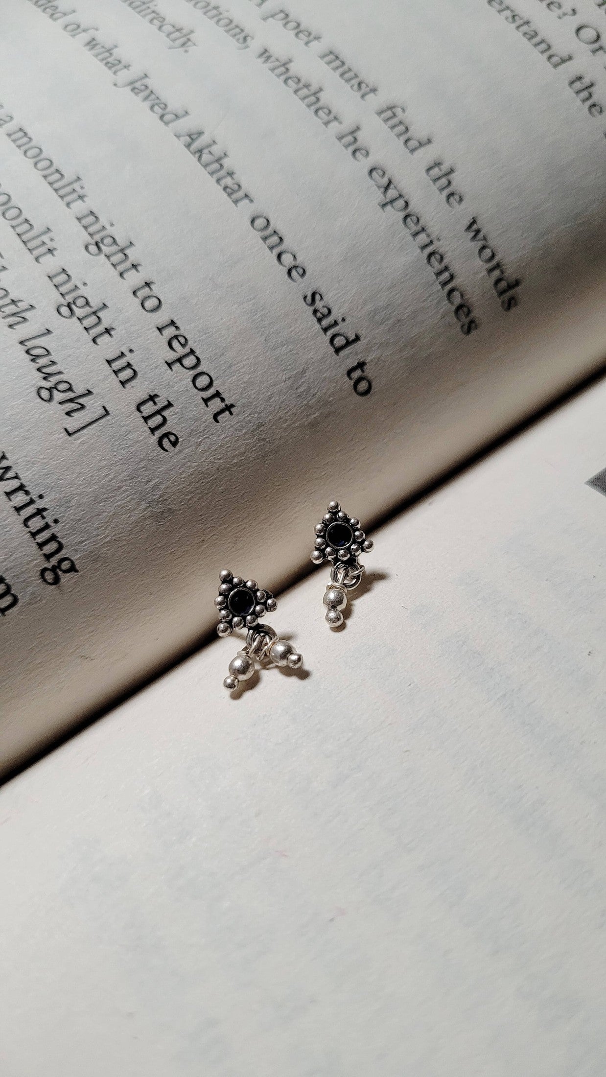 Side view of Athenia Studs in pure silver with handcrafted detailing