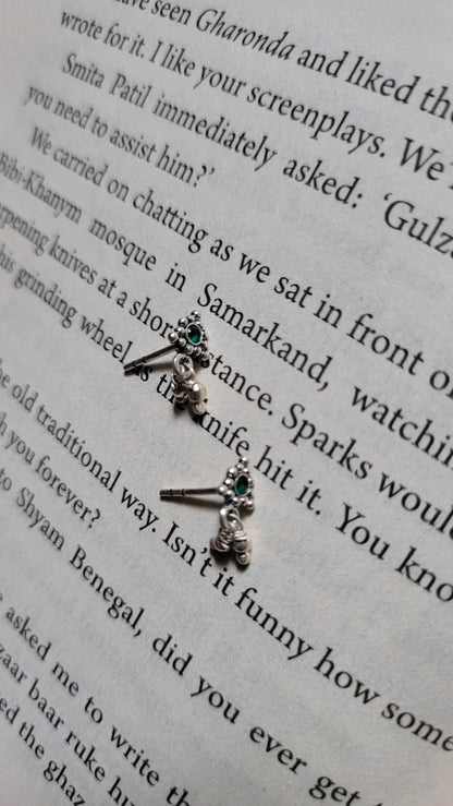 Side view of Athenia Studs in pure silver with handcrafted detailing