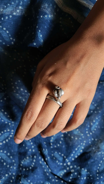 Side view of Athkheli Ring in pure silver with handcrafted detailing