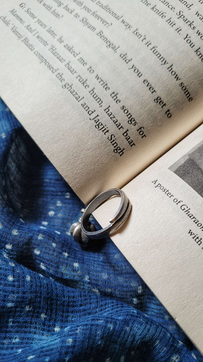 Side view of Athkheli Ring in pure silver with handcrafted detailing