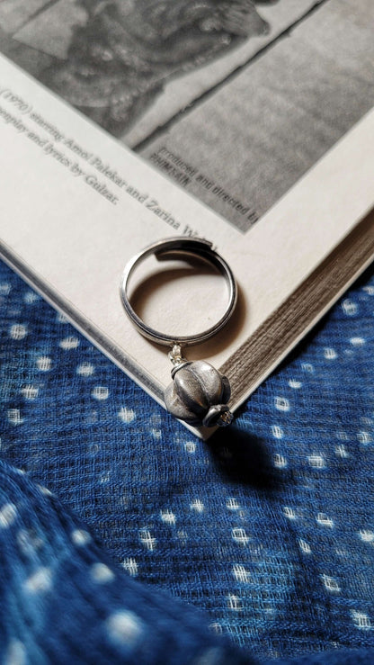 Side view of Athkheli Ring in pure silver with handcrafted detailing