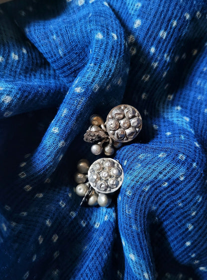 Side view of Badki Vintage Earrings in pure silver with vintage detailing