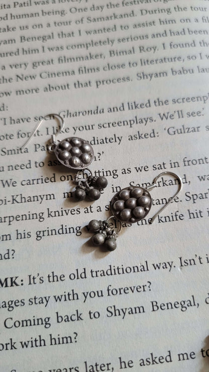 Side view of Badki Vintage Earrings in pure silver with vintage detailing