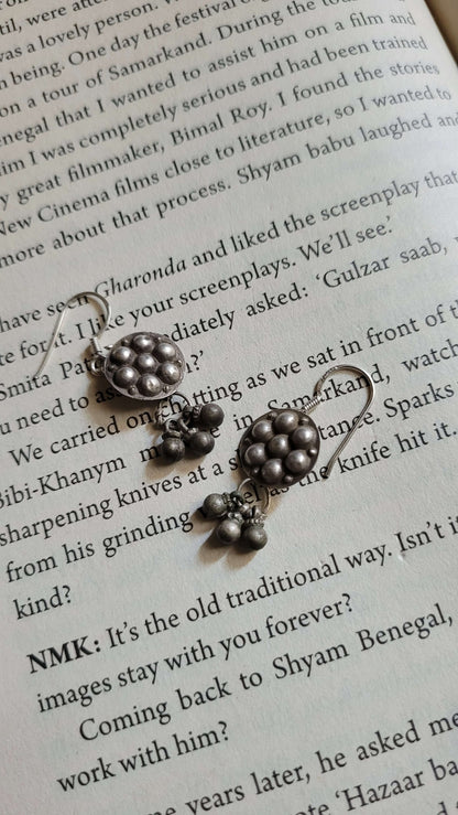 Side view of Badki Vintage Earrings in pure silver with vintage detailing