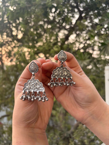Side view of Badra Earrings in pure silver with handcrafted detailing