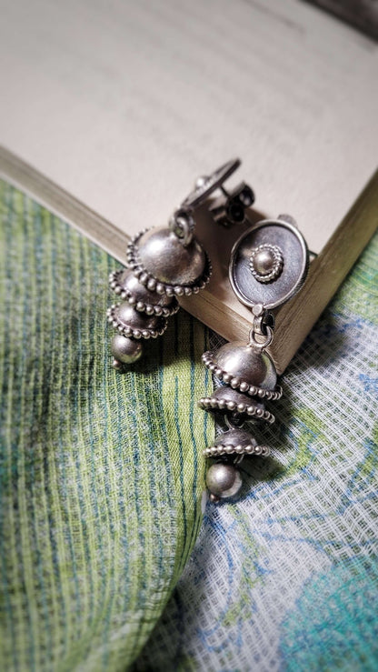 Side view of Balkhaati Jhumka in pure silver with handcrafted detailing