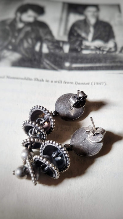 Side view of Balkhaati Jhumka in pure silver with handcrafted detailing