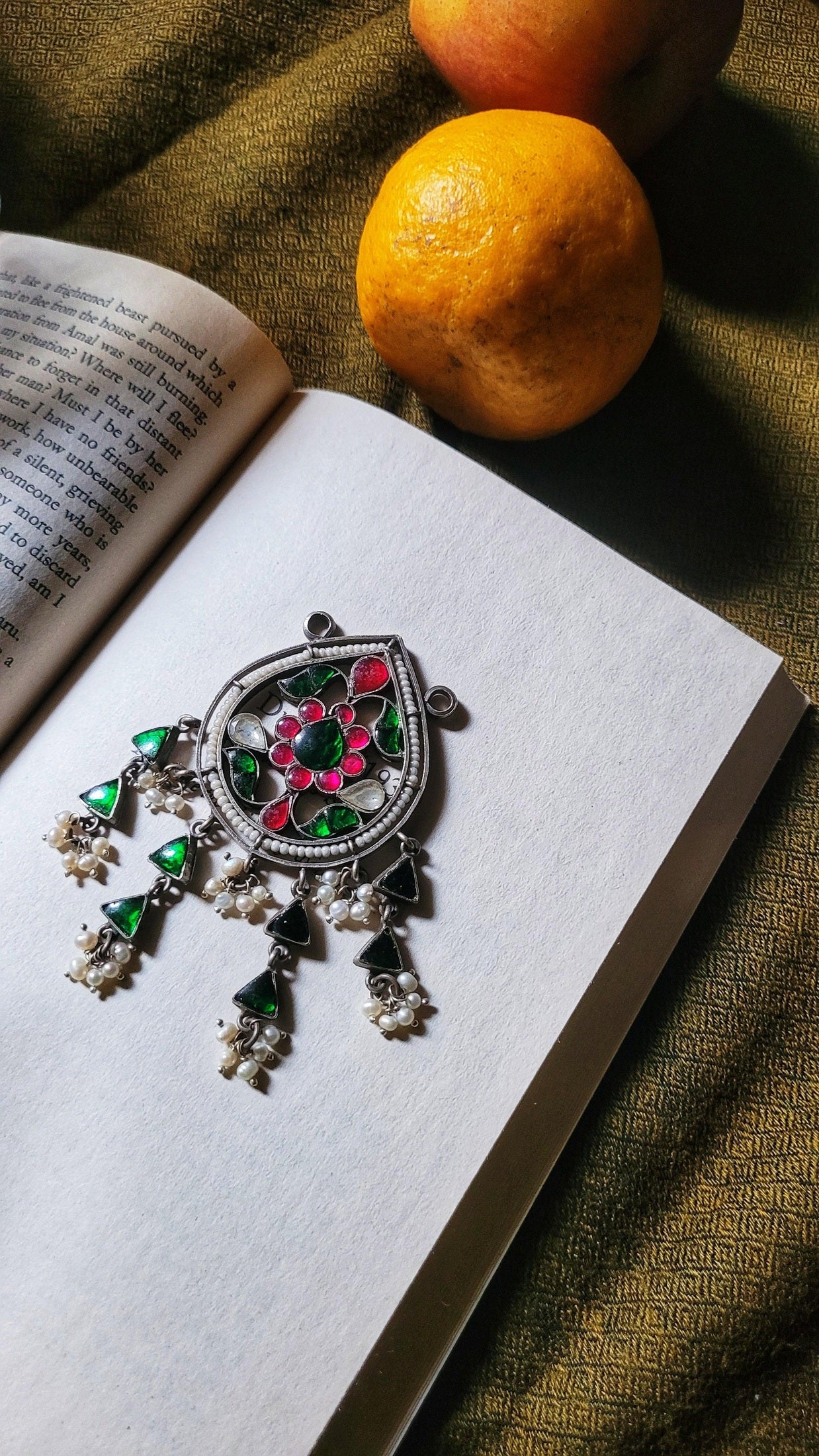 Side view of Bandhanwar Pendant in pure silver with handcrafted detailing