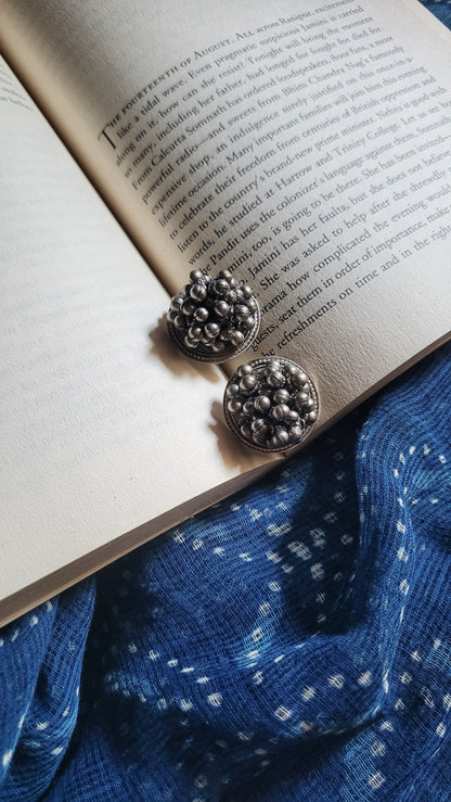 Side view of Brishti Vintage Earrings in pure silver with vintage detailing
