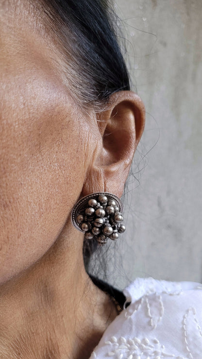 Side view of Brishti Vintage Earrings in pure silver with vintage detailing