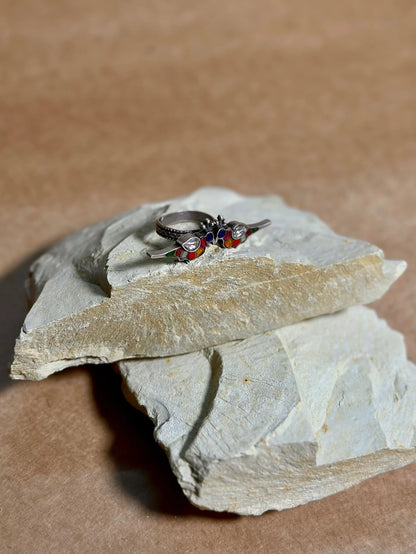 Side view of Bulbul Ring in pure silver with handcrafted detailing