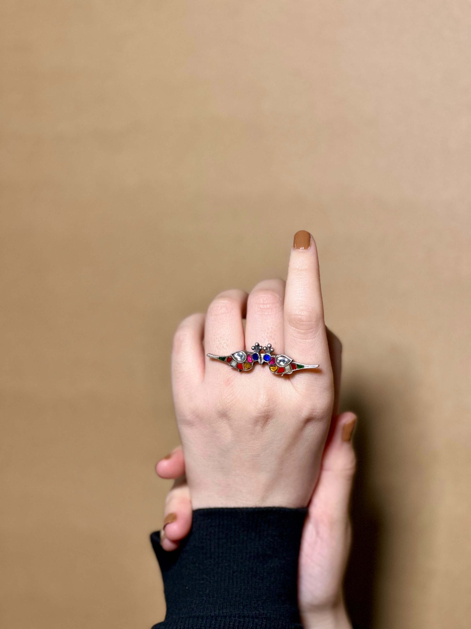 Side view of Bulbul Ring in pure silver with handcrafted detailing